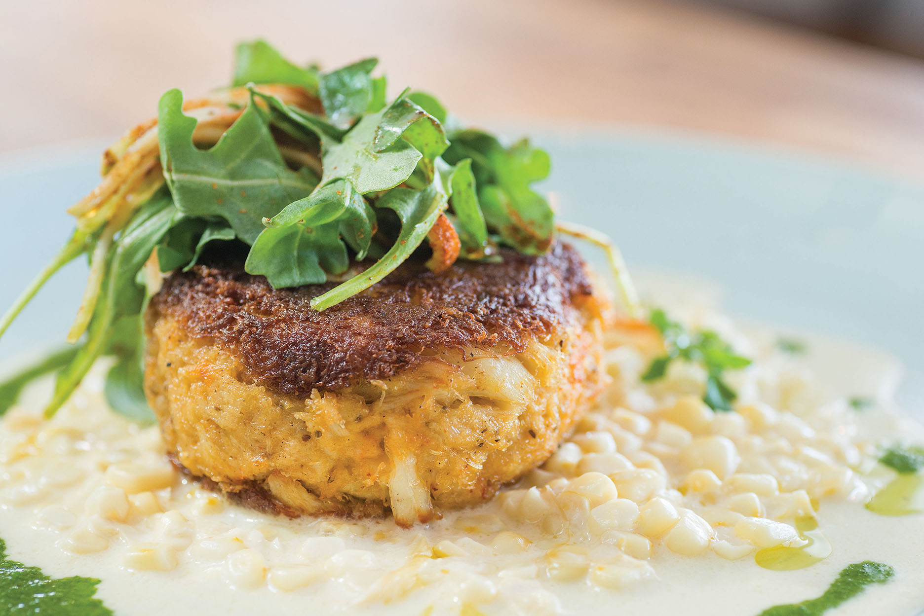 Jumbo Crab Cake with Roasted Corn Puree and Baby Arugula Salad