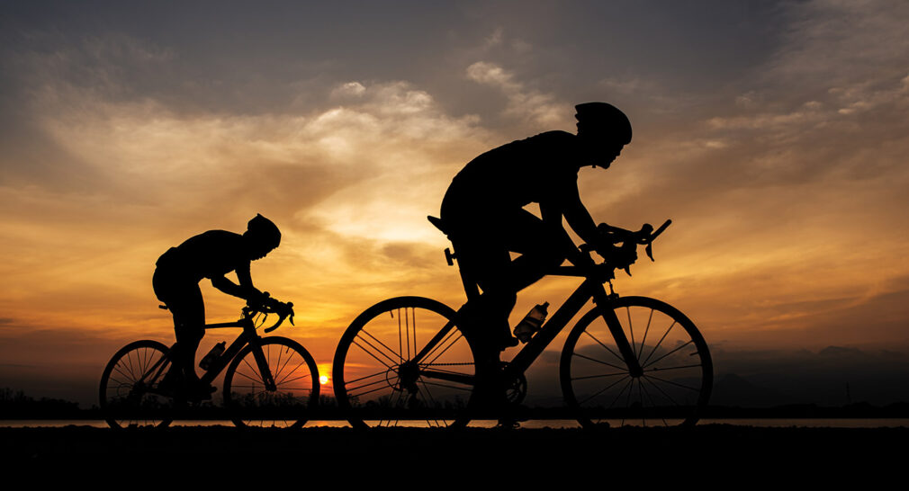 Cyclists at sunset