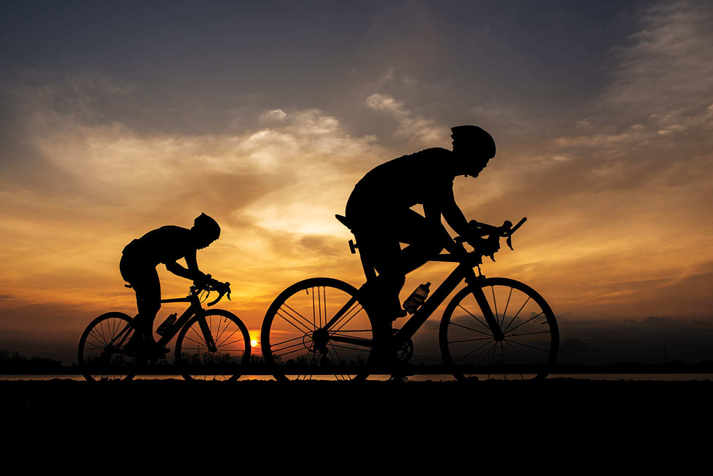 Cyclists at sunset