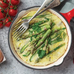 omelette with asparagus on pan , top view