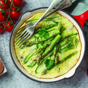 omelette with asparagus on pan , top view